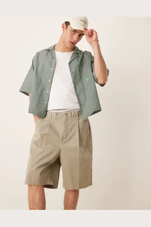 Calvin Klein Pantalones cortos de sastre beis de estilo bermudas de -Neutro