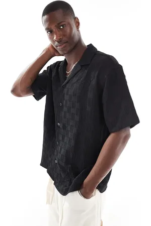 JACK & JONES Camisa negra de manga corta con cuello de solapas de tejido texturizado de