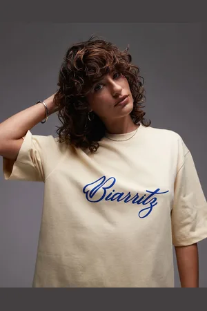 Topshop Camiseta amarillo pastel extragrande con estampado gráfico "Biarritz" de punto liso de