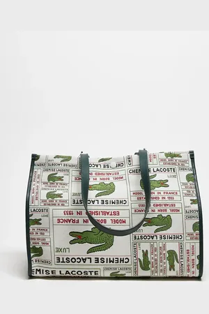 Lacoste Bolso blanco hueso con estampado integral del logo y bordados de jacquard de
