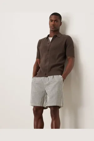 ASOS Pantalones muy cortos color crudo a rayas azul marino de corte ancho de