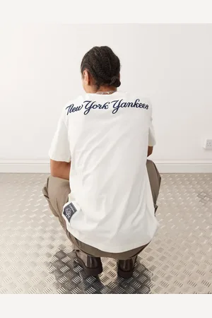 Champion Camiseta blanco hueso de manga corta con estampado "NY" en la espalda de