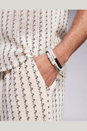 ASOS Pack de 3 pulseras plateadas con diseño variados de cadenas y cuentas de