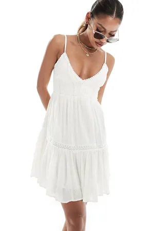 River Island Vestido corto escalonado de