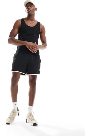 Nike Pantalones cortos de 5" negros de tejido liso Heritage de