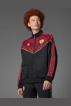 adidas Chaqueta de chándal negra con diseño del Manchester United 