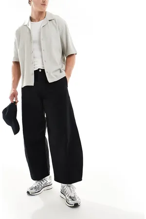 ASOS Pantalones negros extragrandes con pinzas de