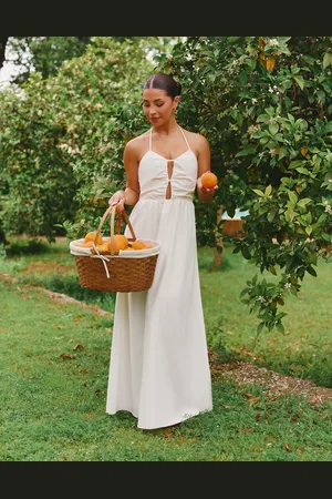 The Frolic Vestido largo con cuello halter y detalle de abertura de tejido efecto lino exclusivo de x Lydia Kara