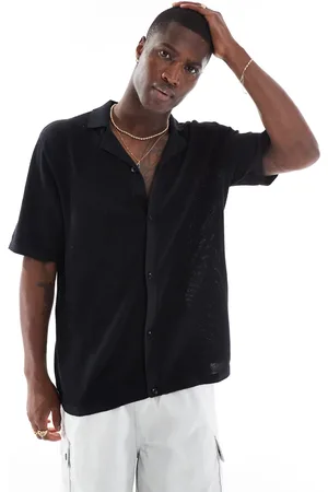 JACK & JONES Polo extragrande con botones de punto de