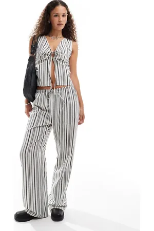 COLLUSION Pantalones a rayas con cinturilla elástica de tejido efecto lino de (parte de un conjunto)