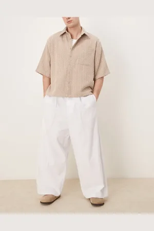 ASOS Pantalones blancos de corte globo holgado con pinzas de