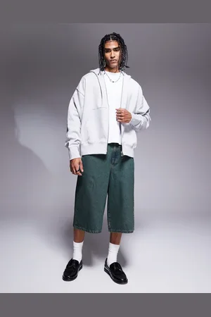 ASOS Pantalones cortos vaqueros de corte alargado con lavado azul oscuro tintado de