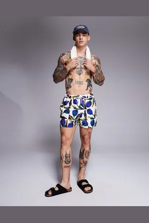 ASOS Shorts de baño cortos blancos con estampado floral de