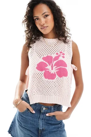 ASOS Chaleco estilo tabardo con patrón de flor de hibisco y cuello redondo de punto de