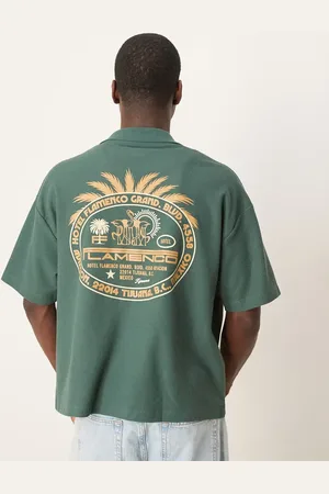 ASOS Polo verde de corte cuadrado extragrande con estampado gráfico de palmera de tejido grueso de 230 g/m² con textura gofrada de