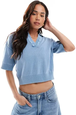ASOS Polo con lavado ácido y detalle de solapas de punto de