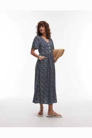 & OTHER STORIES Vestido camisero semilargo con bajo de pico de