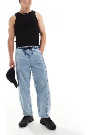 ASOS Vaqueros azules elásticos extragrandes con lavado medio y logo ADS de