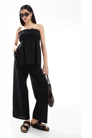 Esmée Pantalones negros de pernera holgada de tejido efecto lino exclusivos de Esmee