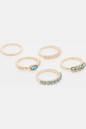 ASOS Multipack de anillos variados dorados con detalle de piedras de imitación y piedras azules de