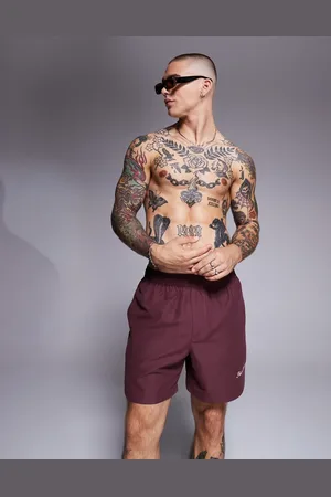 ASOS Shorts de baño de largo medio con detalle bordado de -Rojo