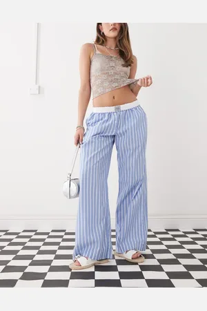 Monki Pantalones azules a rayas blancas de pernera ancha sin cierres con cinturilla con vuelta de