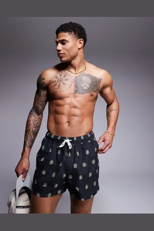 ASOS Shorts de baño cortos negros con estampado de algas de