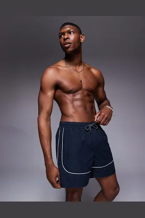 ASOS Shorts de baño de largo medio con ribetes blancos en contraste de