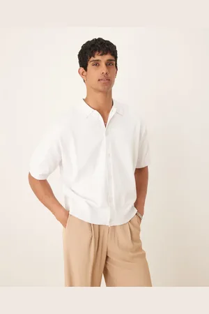 ASOS Polo de corte cuadrado extragrande con botones de punto de algodón de