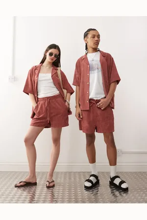 Reclaimed Pantalones cortos rosas unisex de pana de