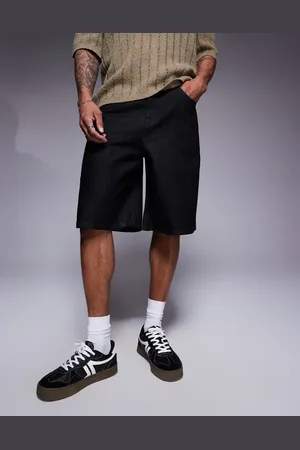ASOS Pantalones cortos vaqueros negros de corte alargado y estilo carpintero de