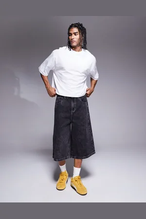 ASOS Pantalones cortos vaqueros negros de corte alargado de