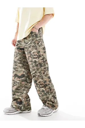 ASOS Pantalones muy holgados con estampado de camuflaje de