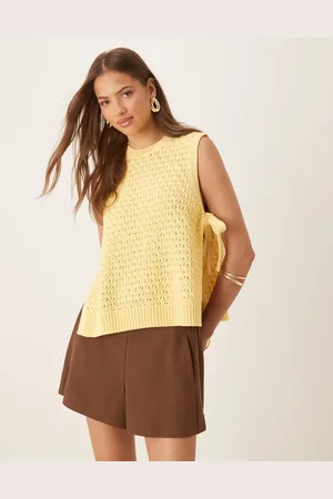 ASOS Chaleco pastel de estilo tabardo con lazadas laterales de punto de croché de