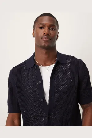 MANGO Camisa negra holgada de manga corta de croché de algodón de