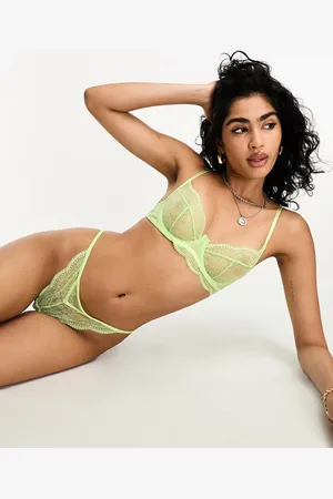 Hunkemöller Tanga de pernera alta con diseño de tiras de encaje Isabelle de Hunkemöller
