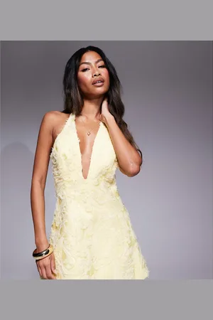 Murci Vestido corto amarillo escotado con cuello halter de tejido texturizado exclusivo de