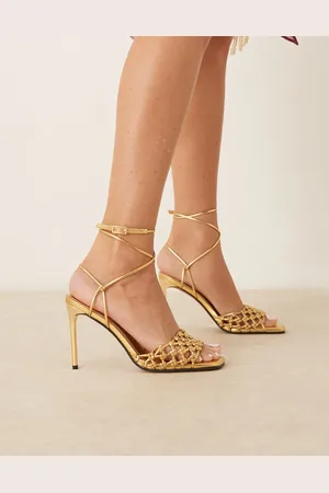 ASOS Sandalias doradas de tacón alto con diseño anudado Nadine de