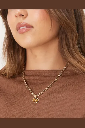 ASOS Collar dorado con colgante de ojo de tigre auténtico de