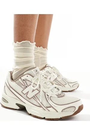 New Balance Zapatillas de deporte y marrones 740 exclusivas en ASOS de -Neutro