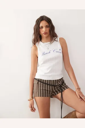 COLLUSION Camiseta blanca sin mangas con estampado de punto calado de