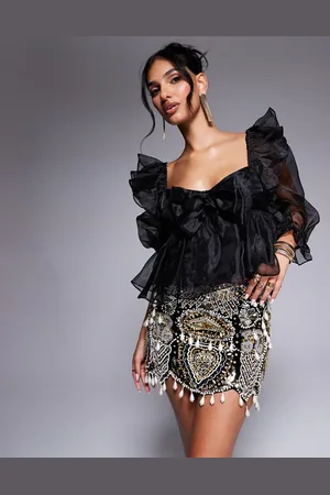 ASOS Minifalda negra de terciopelo con abalorios de gemas y perlas colgantes de