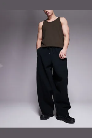 ASOS Pantalones negros holgados y extragrandes con cintura elástica de