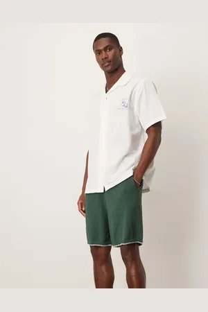 ASOS Pantalones cortos extragrandes con pespuntes de festón de punto de