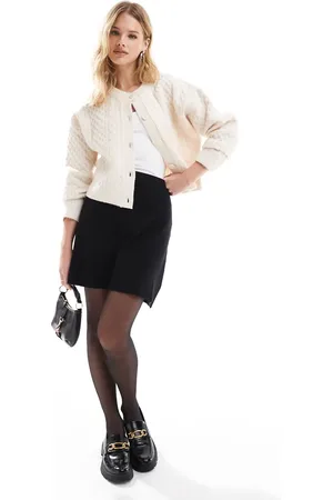 VERO MODA Minifalda negra con cremallera en la parte trasera de punto de