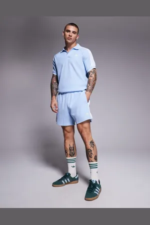 adidas Pantalones cortos azules de punto gofrado de