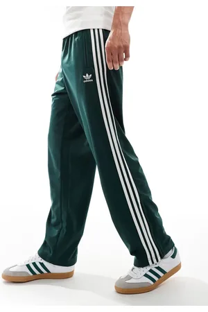 adidas Pantalones de chándal verde oscuro Firebird de