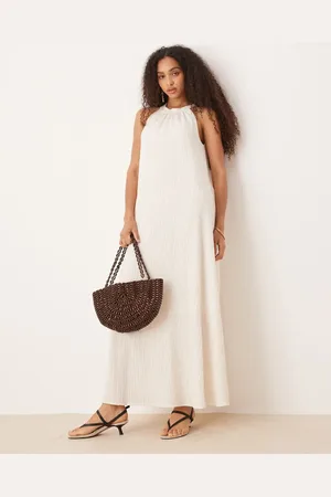 AWARE Vestido largo blanco con cuello halter de tejido texturizado de