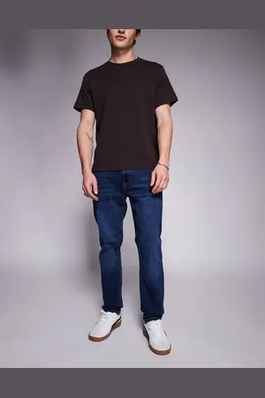 River Island Vaqueros de corte slim con lavado en de -Azul marino