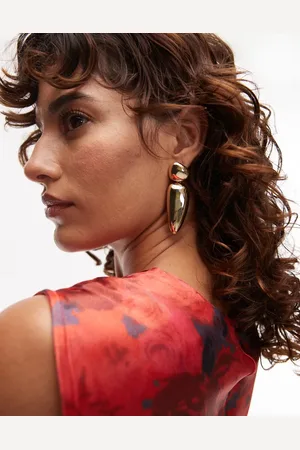 Topshop Pendientes largos dorados con diseño llamativo en forma de lágrima Eva de